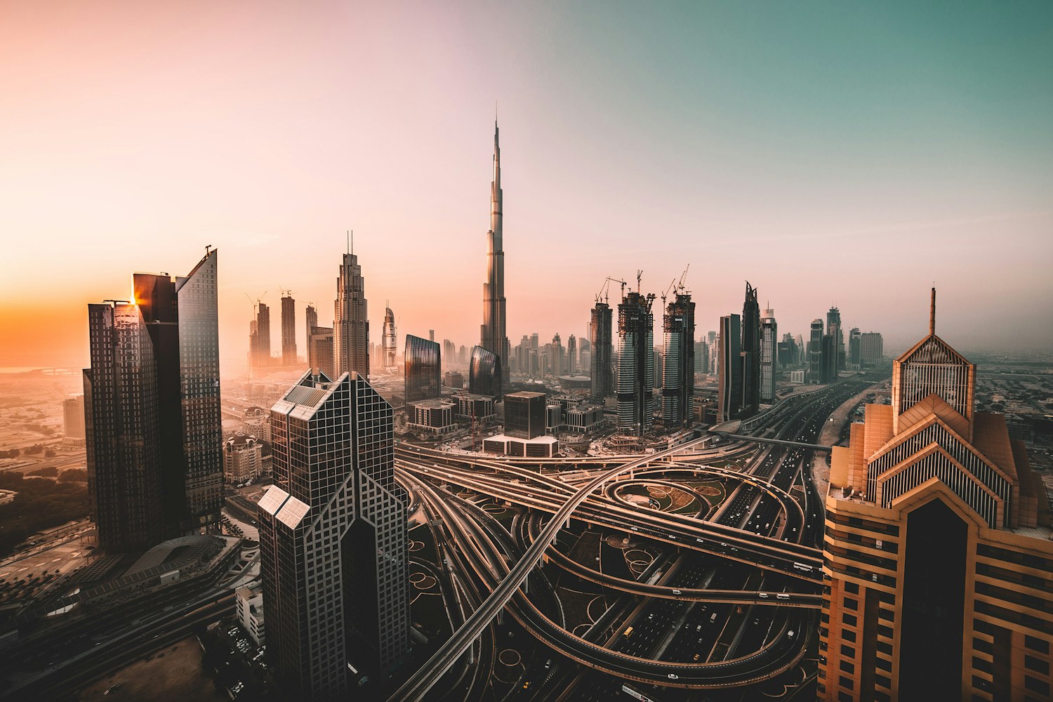 Dubai skyline and Burj Khalifa at sunset